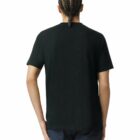 Person with braided hair wearing a plain black t-shirt and jeans, shown from the back.