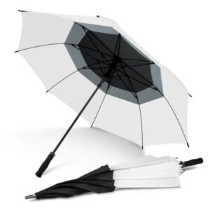 Black and white beach umbrellas, both open and closed, on a white backdrop.