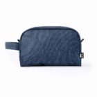 A blue fabric toiletry bag with a side handle on a white background.