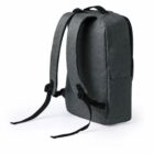 Dark gray backpack with black straps, shown from a rear side angle on a white background.