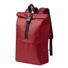 Red backpack with black straps and a front pocket on a white background.