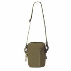 A small, olive-colored crossbody bag with an adjustable strap.
