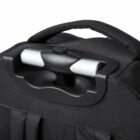 Close-up of a black suitcase with a retracted telescopic handle.