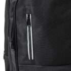 Close-up of a black backpack with a vertical zippered pocket and white accents.