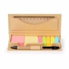 Stationery set with sticky notes, pen, and ruler in a cardboard case.
