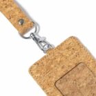 Cork ID holder with a metal clip and transparent window.