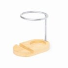 Bamboo and metal stand with a circular base and vertical support.