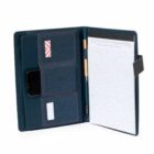 Open blue notebook with pen, sleeves for cards, and lined paper on the right.