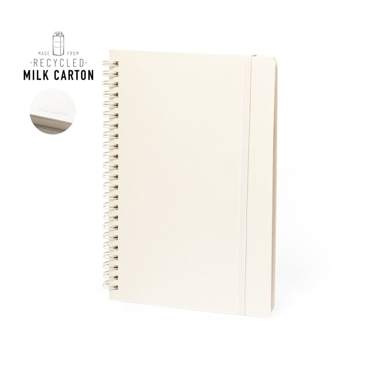 White spiral notebook made from recycled milk cartons, with an elastic band closure.