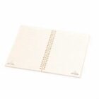 Open spiral notebook with lined pages on a white background.