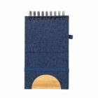 Blue spiral notebook with a wooden accent at the bottom.