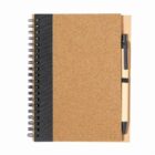 Spiral-bound notebook with a cork cover and a pen attached to the side.