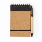 A spiral-bound notebook with a black pen attached to its side.