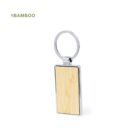 Rectangular bamboo keychain with metal edges on a white background.
