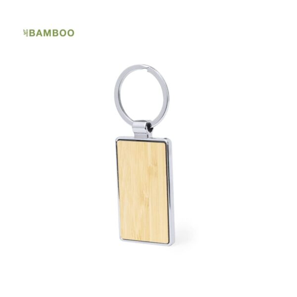 Rectangular bamboo keychain with a metal frame and a circular ring.