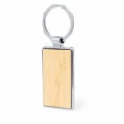 Rectangular keychain with a wooden center and a metal frame.