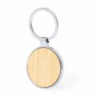 Round metal keychain with a wooden center insert.