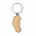 Keychain with a car-shaped wooden accent and round metal ring on a white background.