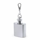 Small silver flask with a keychain clip attached to the cap.