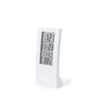 White digital clock showing time, date, day, and temperature on a stand.