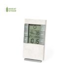 Digital desk clock with weather display and buttons, labeled Wheat Straw.