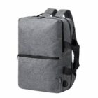 Gray rectangular backpack with black zippers and adjustable straps.
