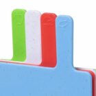 Four colorful chopping boards with food icons on the tabs.