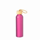 Pink metal water bottle with a wooden cap and yellow strap.