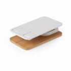 Phone stand with bamboo and speckled white cover, angled side view.