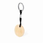 Round wooden keychain with a black rope and metal ring, isolated on a white background.