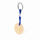 Wooden keychain with a blue cord and silver ring against a white background.
