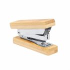 Wood-sided stapler with a silver metal mechanism, isolated on a white background.