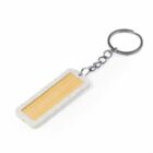 Wooden rectangular keychain with a metal ring and chain.