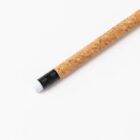 Cork-handled pencil with an eraser on a white background.