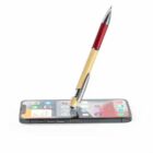 Pen creatively balanced on a smartphone screen with app icons visible.