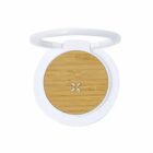 Round white portable speaker with a wood-textured center and small perforated design.
