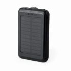 Black solar power bank with LED indicators on a white background.