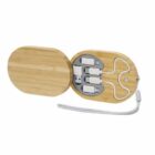 Oval bamboo case with various USB adapters and cables inside.