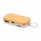 Rectangular wooden power bank with USB ports and a short charging cable attached.