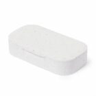White rectangular soap with speckled texture, shown on a plain background.