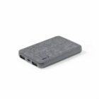 Gray, rectangular power bank with a fabric texture and multiple USB ports.