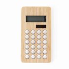 A bamboo calculator with white round buttons on a white background.