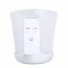 Digital kitchen scale with a white translucent container and control buttons.