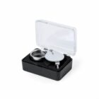 Magnifying loupe in an open black plastic case with a transparent lid.