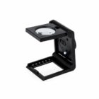 Folding magnifier with a square base and attached measuring scale.