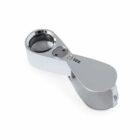 A silver handheld magnifying lens with 30X marking.