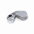 Silver folding magnifying loupe labeled 30X on a white background.