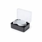 Silver pocket magnifier in a black plastic case with a clear lid.