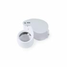 30x magnifying jewelers loupe with a white metal casing.