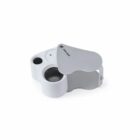 Silver magnifying loupe with 30x-21mm text, partially open on a white background.